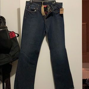 Lucky brand new  size 33 mid rise sweet n low jean